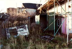 Picture 9. The datestone was positioned on the wall of the cottage to the back of this picture