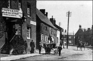 WH High St South side 1 - The Crown and Crown Lane cottages before demolition.